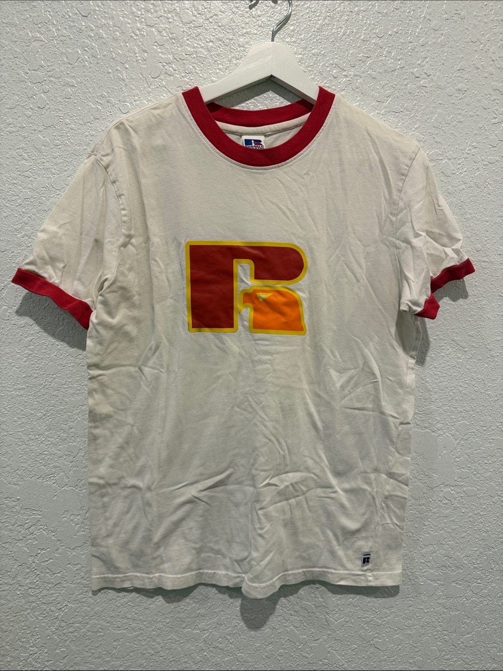 Retro Russell Athletic White Ringer Tee with Red Trim and Yellow-Accented Logo